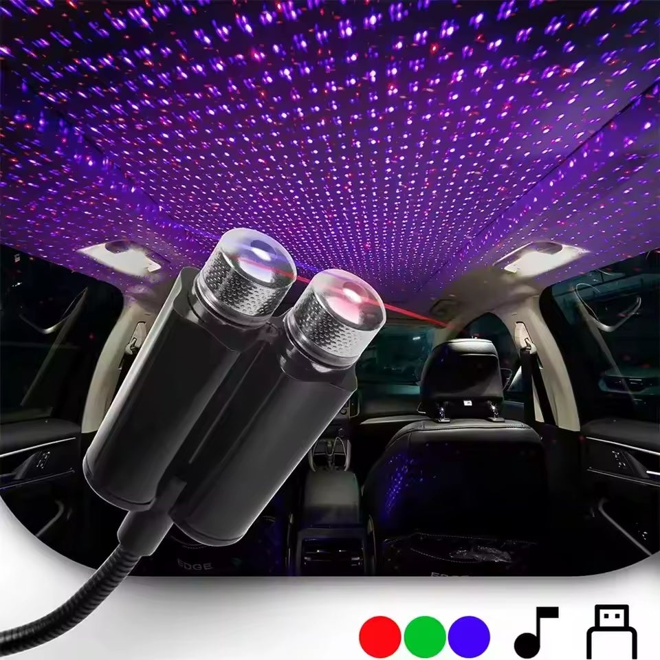 Starry sky projector casting stars across the car roof